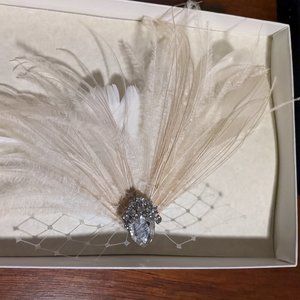 Feather hairpiece with jewel white & cream colored feathers